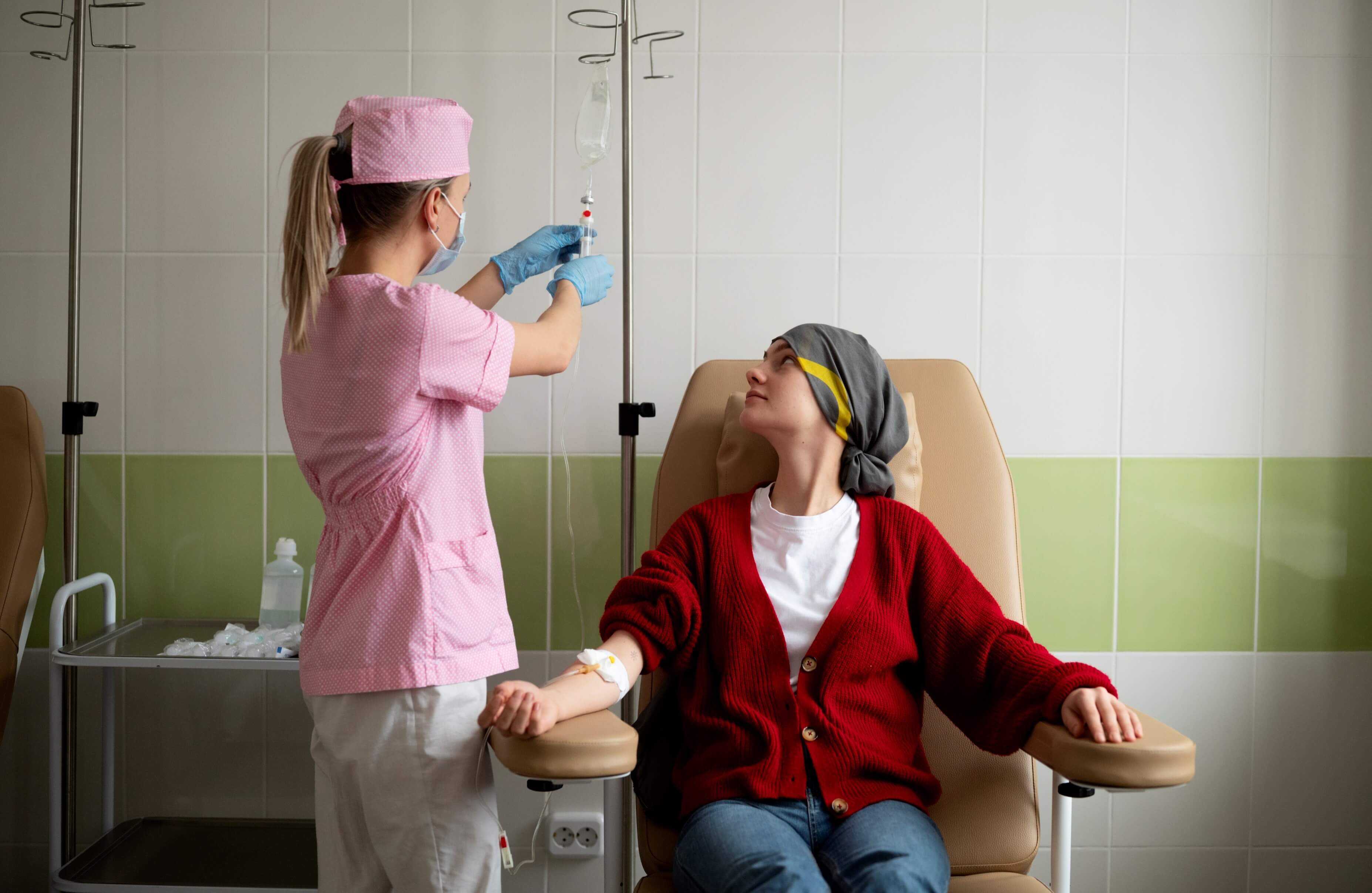 Oncology Nurse giving chemotherapy treatment to cancer patient