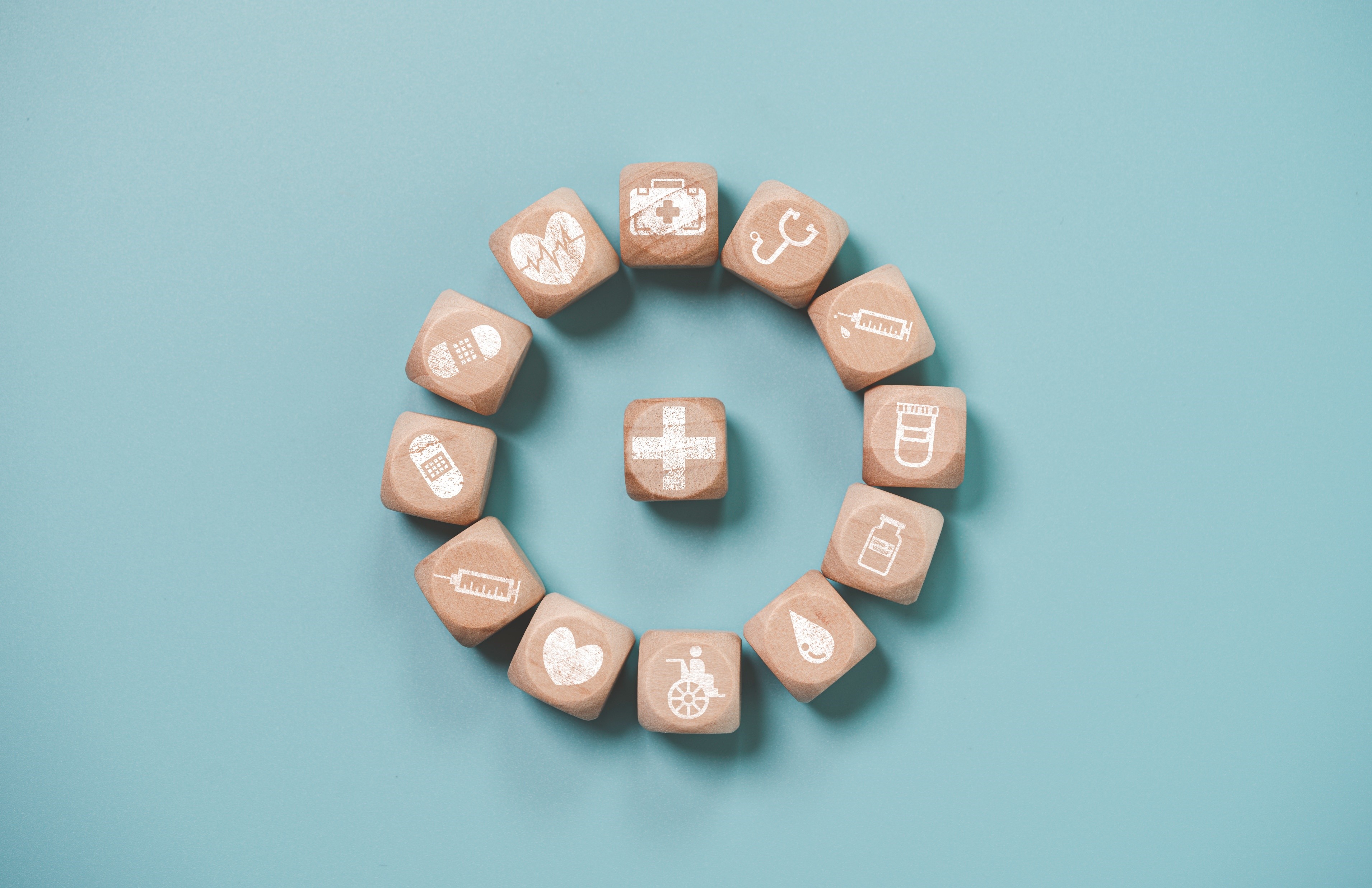 wooden-block-cube-which-print-screen-health-care-medical-icons-healthy-wellness-concept